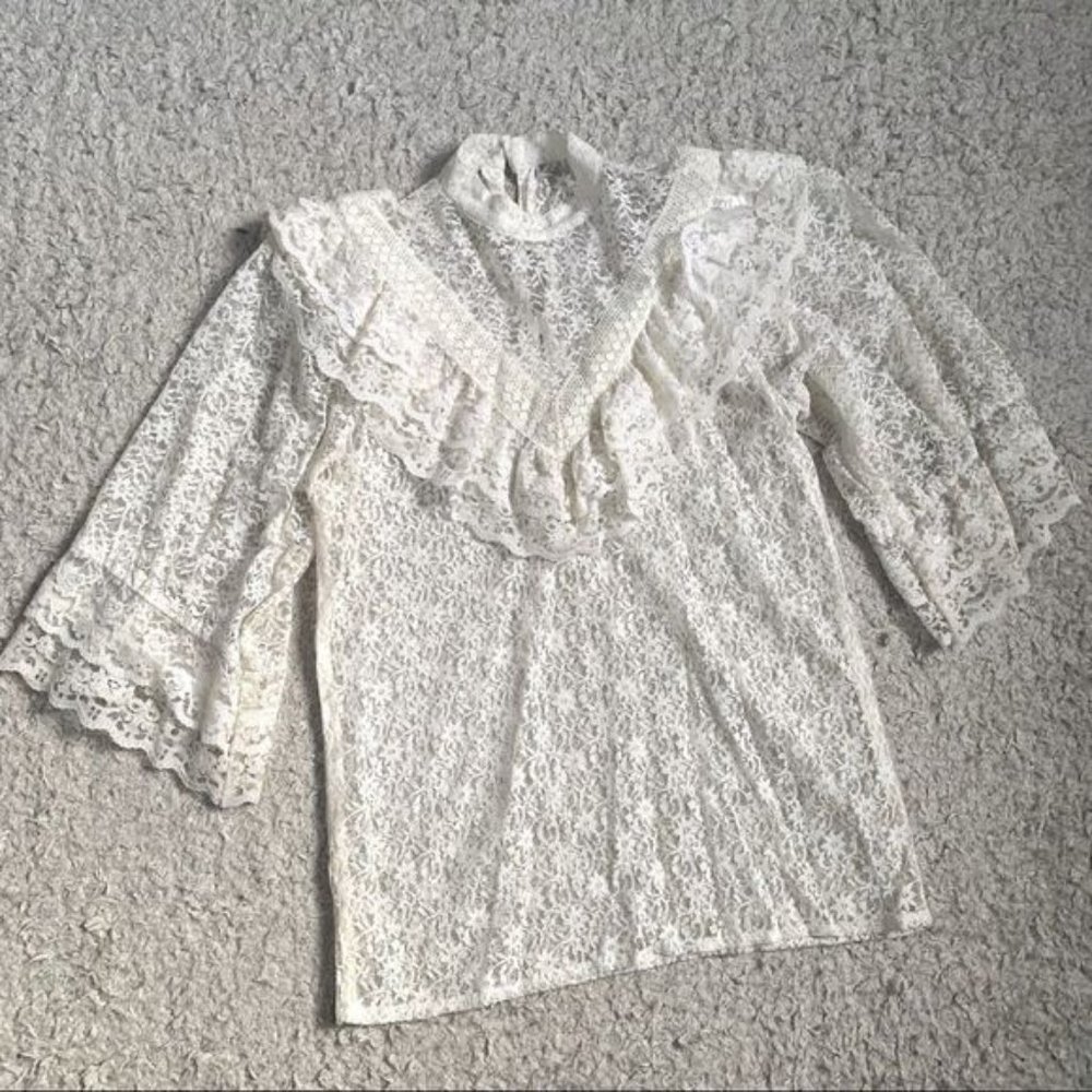 Lace ruffle mock neck top